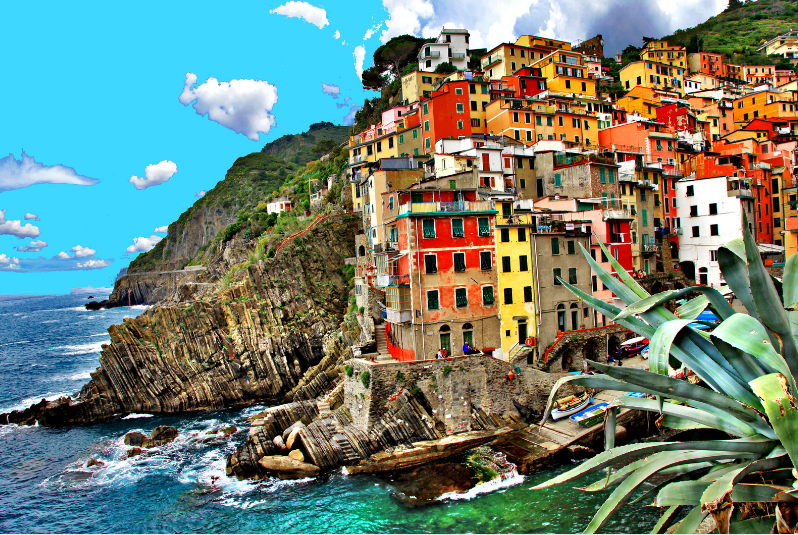 Tourist Attractions in Italy,A vibrant coastal village with colorful buildings on a rocky shoreline near the sea.